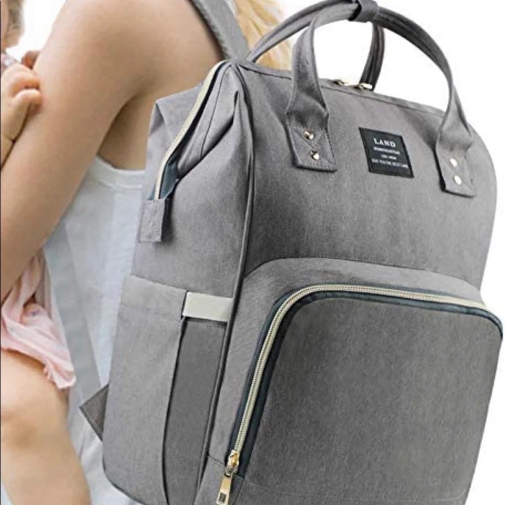 Living Traveling Share Green camo Diaper Backpack